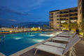 poolside nightscape rendering gran ciudad luxury apartment homes